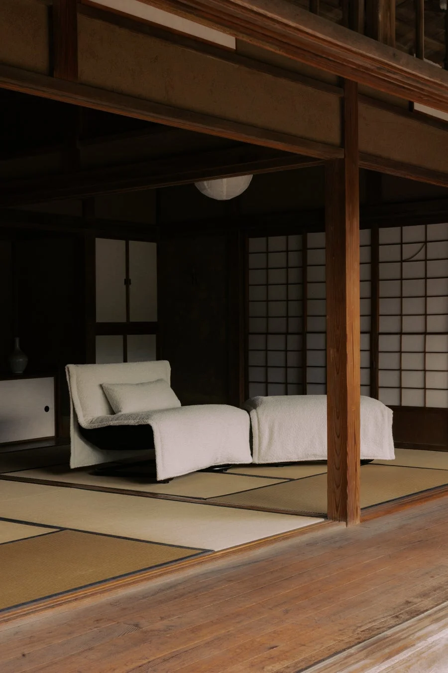 OZU lounge chair and ottoman in a traditional Japanese room